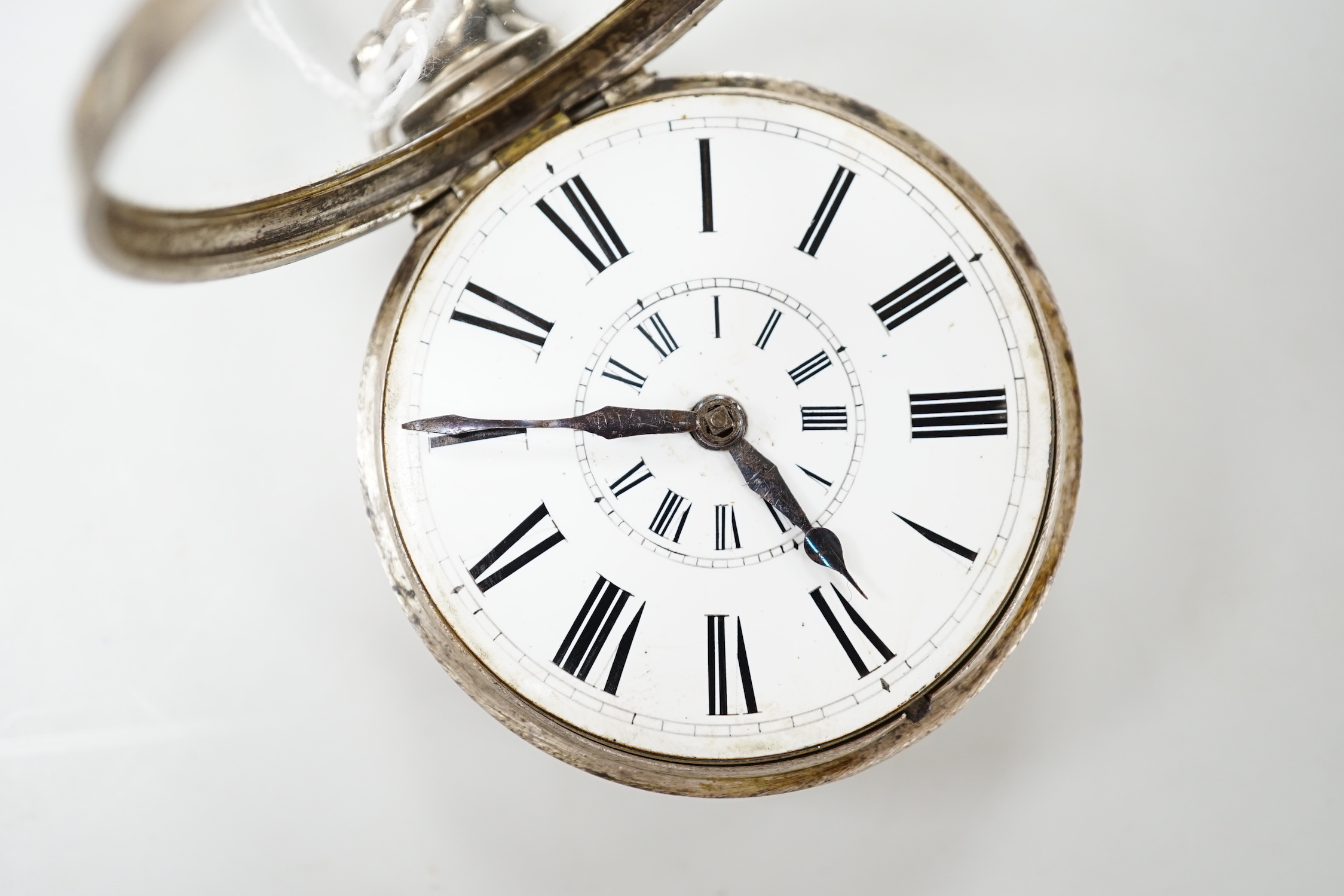 A 19th century silver pair cased keywind verge pocket watch, by Bartlett of Maidstone, case diameter 64mm.